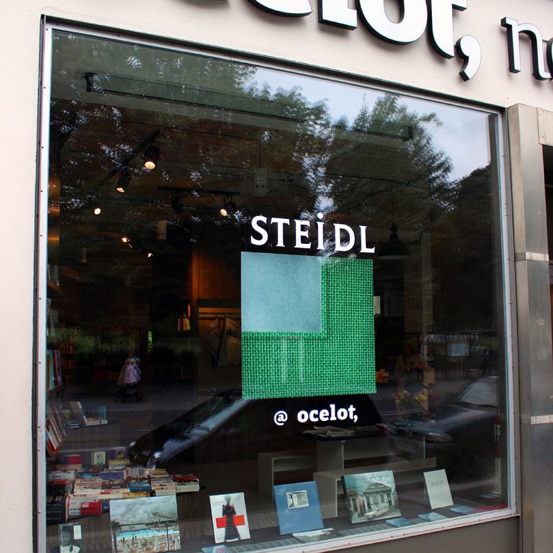 Modern bookshop window display for Steidl books